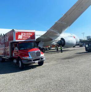 NorthStar Moving international moving company loading at an airport directly from an airplane.