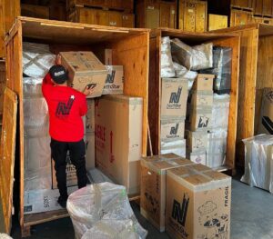 NorthStar Moving loading a storage vault for a client.