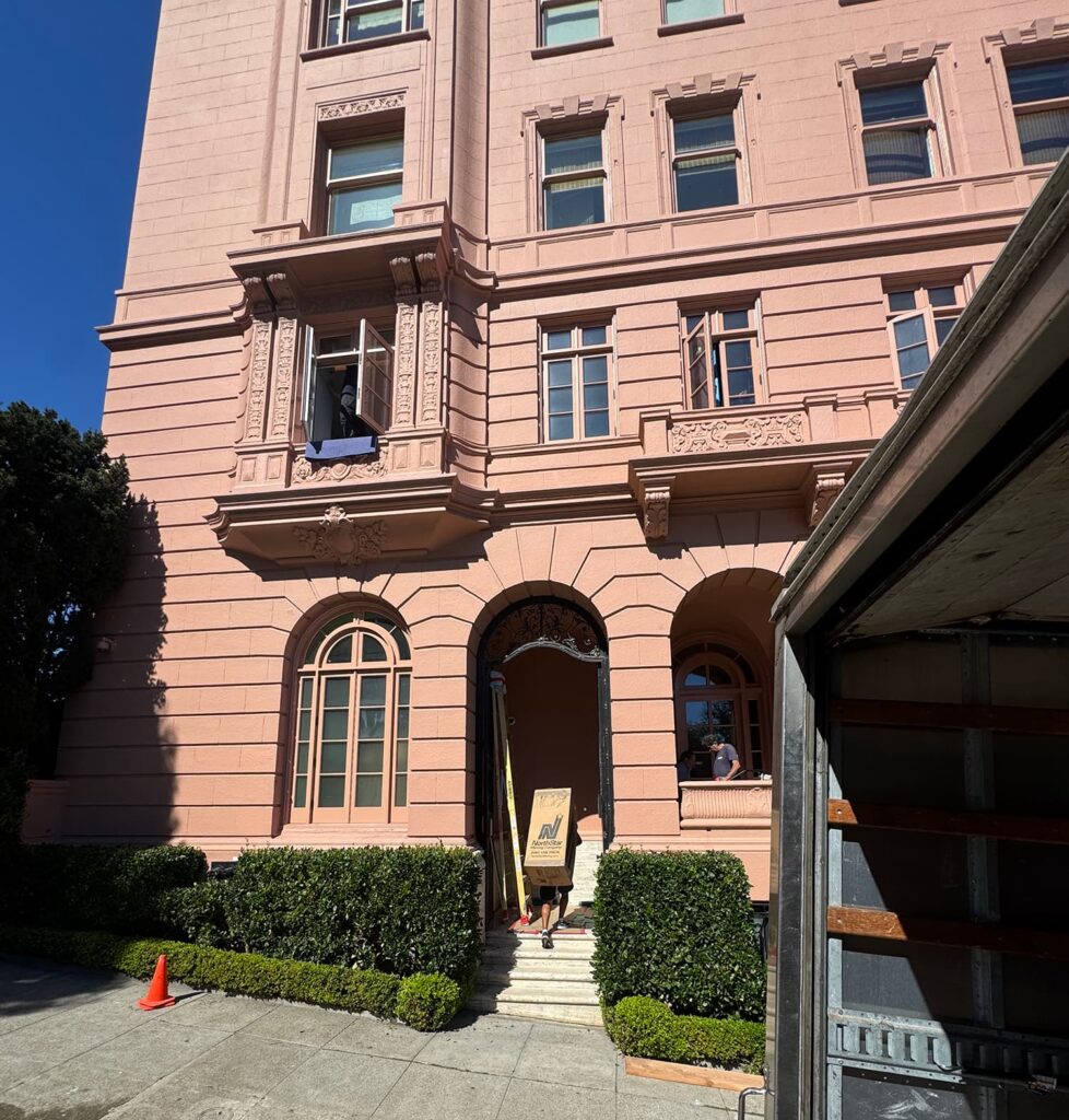 NorthStar Moving team carrying moving boxes in San Francisco on a long distance move