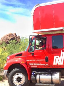 Local Phoenix Moving company NorthStar Moving driving by Camelback Mountain in Phoenix, Arizona