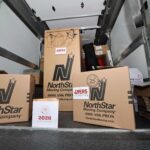 NorthStar Moving boxes in the back of our electric van during a move for the 49ers Foundation's 2026 annual Golden Getaway Weekend & Celebrity Golf Tournament