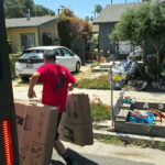 A mover delivering part of our 200 boxes donation.