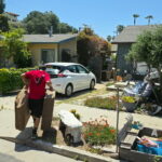 A mover delivering part of our 200 boxes donation.